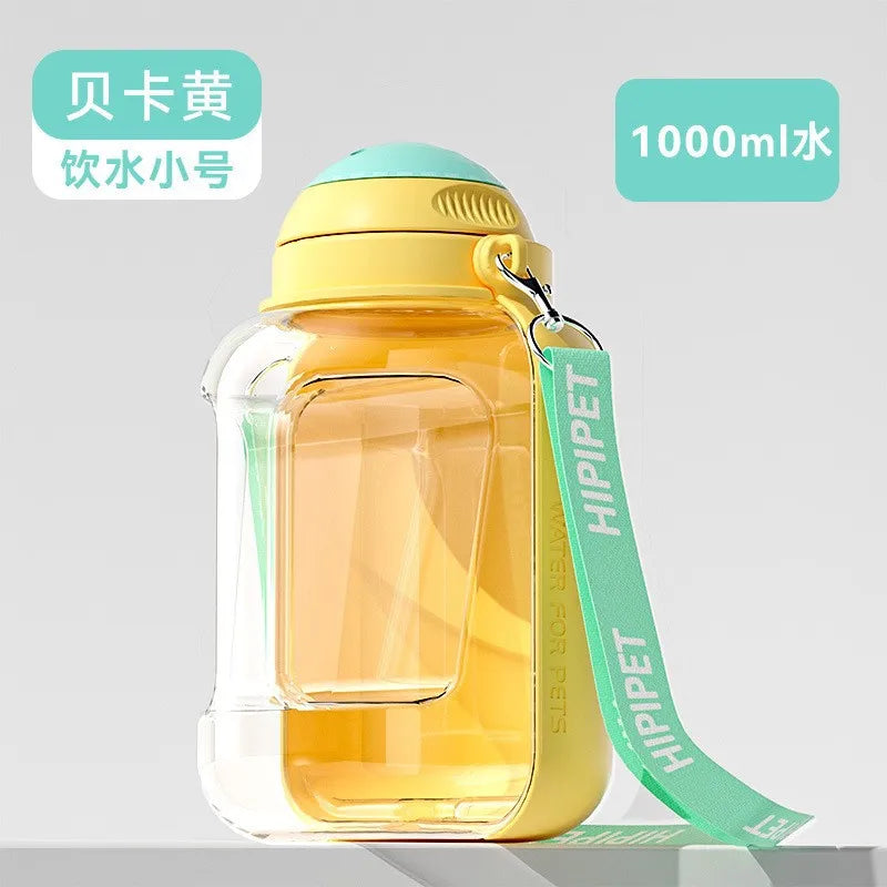 Yellow and clear pet water bottle with a green strap and 'HIPIPET' branding on a gray background.